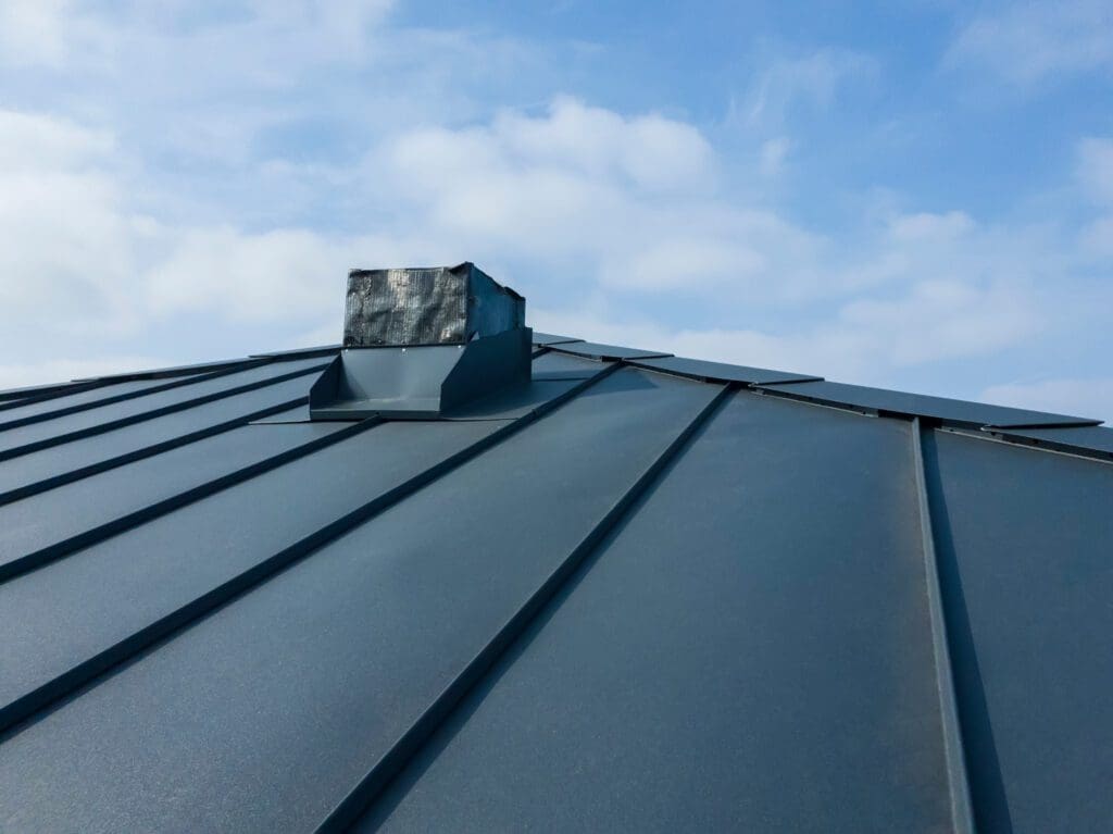 A standing seam metal roof with concealed screws.