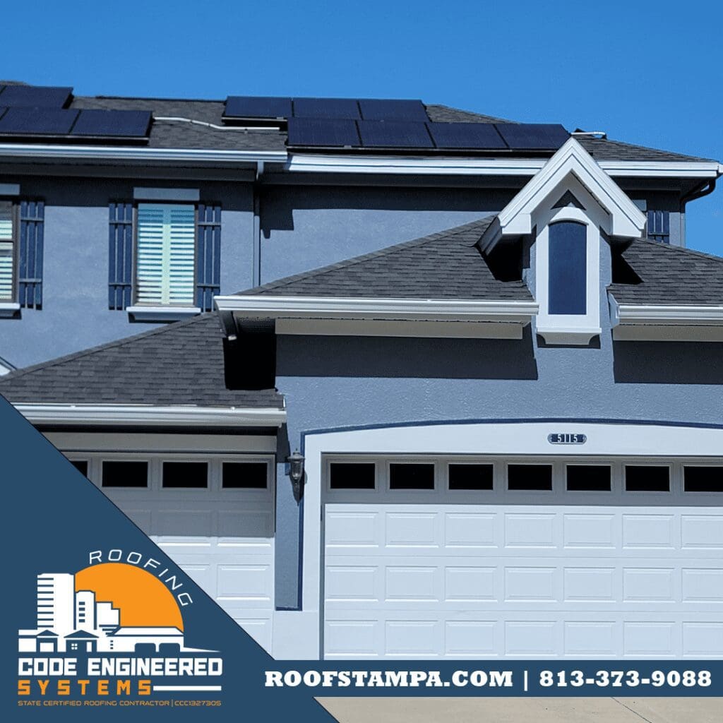 GAF Charcoal Shingles on a Blue House House with White Trim and White Drip Edge Roofing