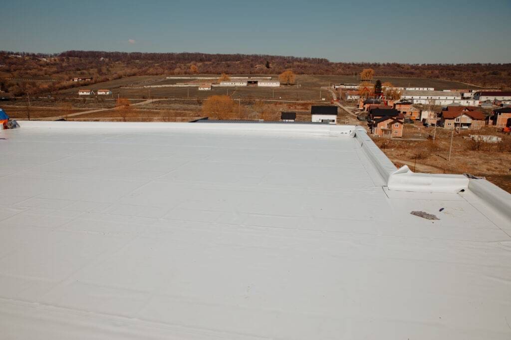 adding pitch to a flat roof